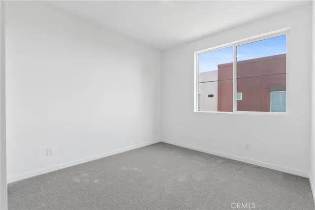 a view of a swimming pool with outdoor seating