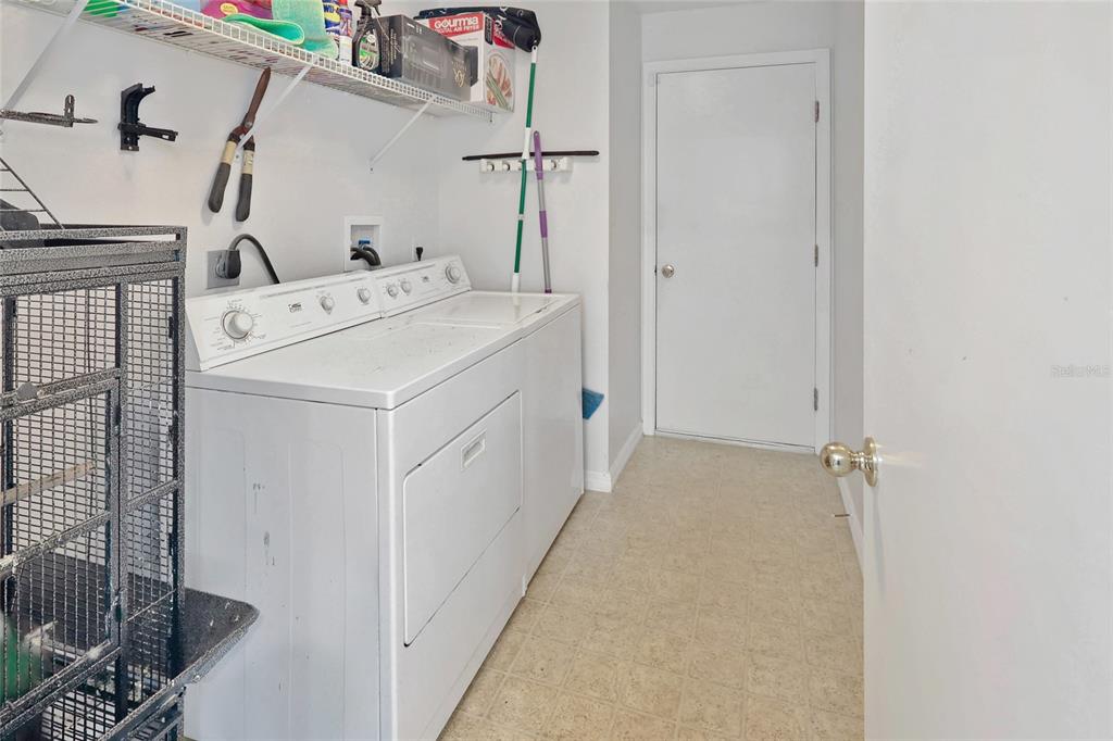16816 Rising Star Drive Clermont, FL 34714 - Photo 12 of 21 a utility room with dryer and washer