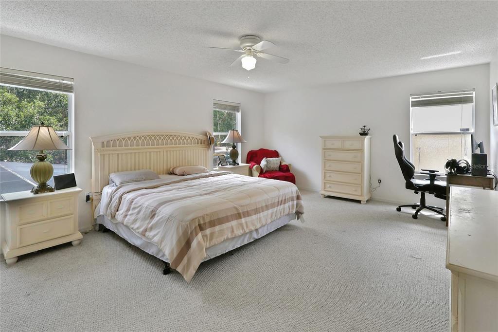 16816 Rising Star Drive Clermont, FL 34714 - Photo 15 of 21 a bedroom with a bed and a window