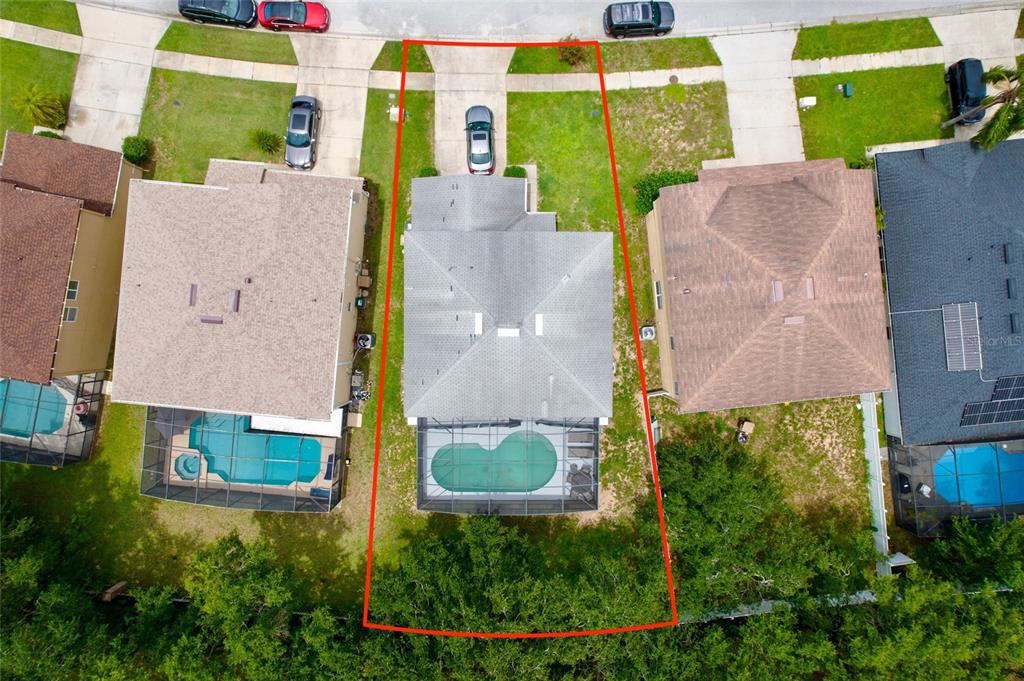 16816 Rising Star Drive Clermont, FL 34714 - Photo 2 of 21 an aerial view of residential houses with outdoor space and street view