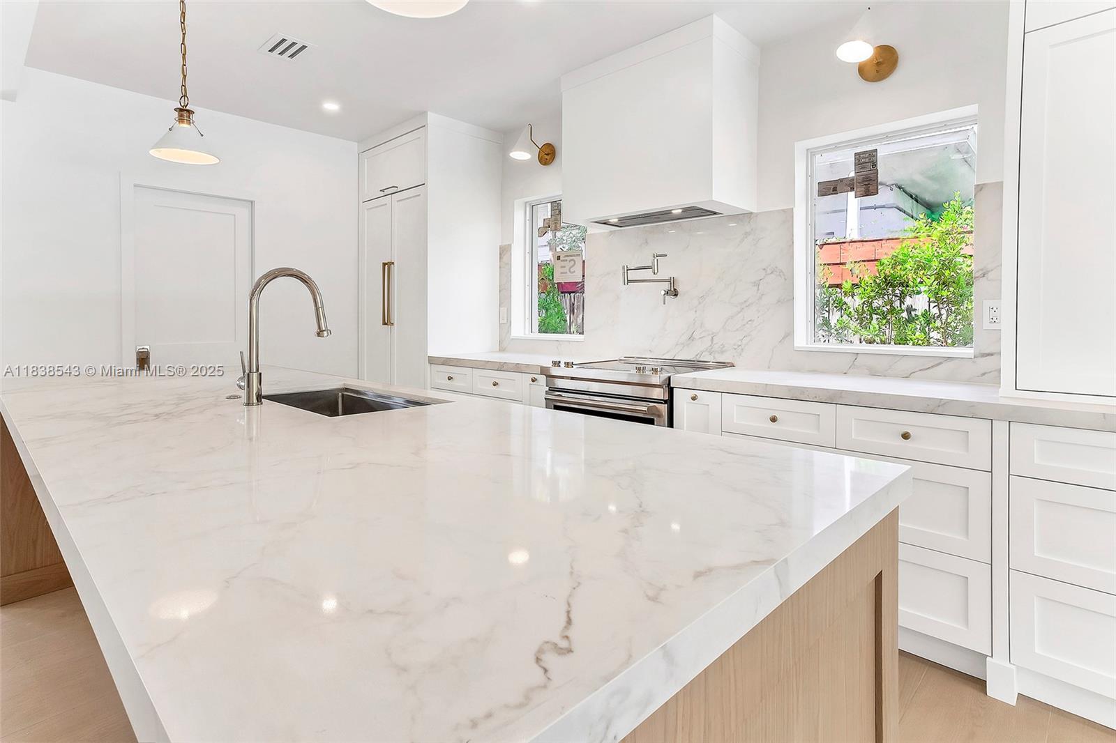 Normandy Isle Miami Beach, FL 33141 - Photo 13 of 43 a close view of sink and tap