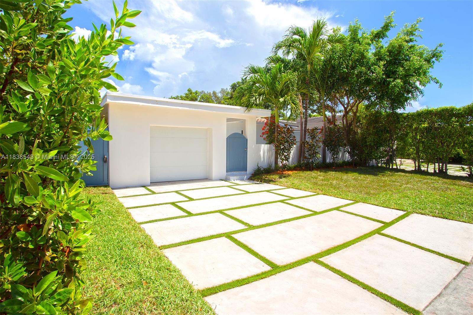Normandy Isle Miami Beach, FL 33141 - Photo 2 of 43 a house with a yard