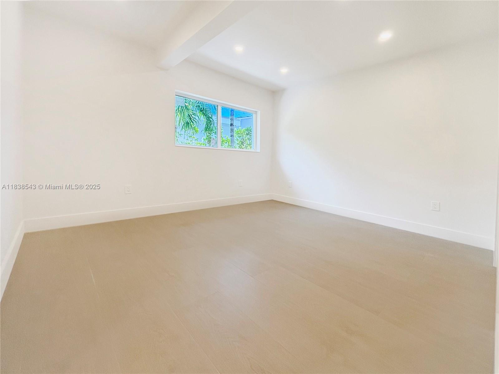 Normandy Isle Miami Beach, FL 33141 - Photo 35 of 43 an empty room with a workbench