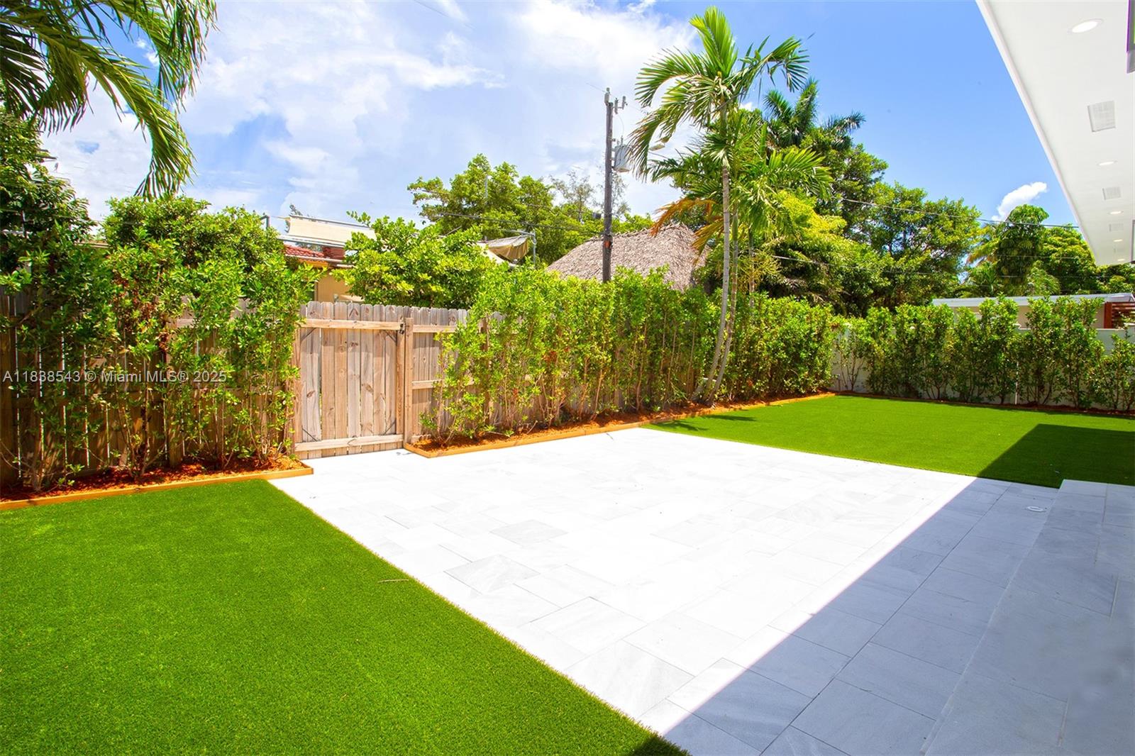 Normandy Isle Miami Beach, FL 33141 - Photo 7 of 43 a view of a backyard with a garden