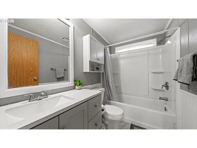 a black and white photo of a living room
