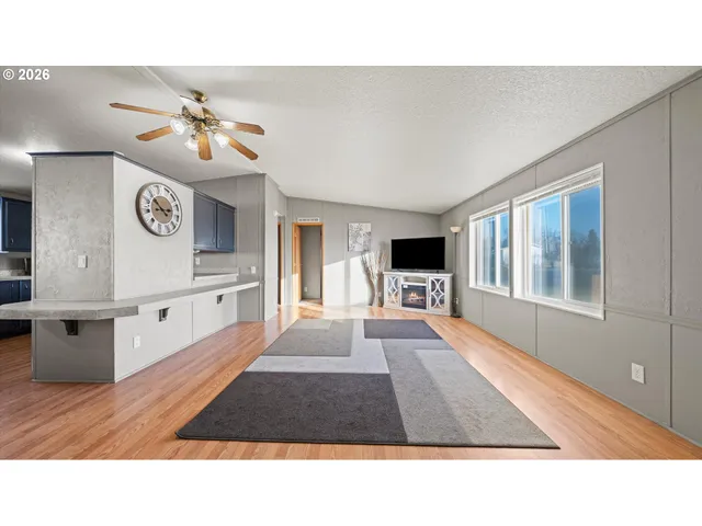 a open kitchen with stove and window