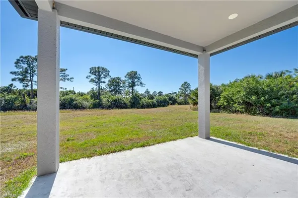 a view of a garden with an outdoor space
