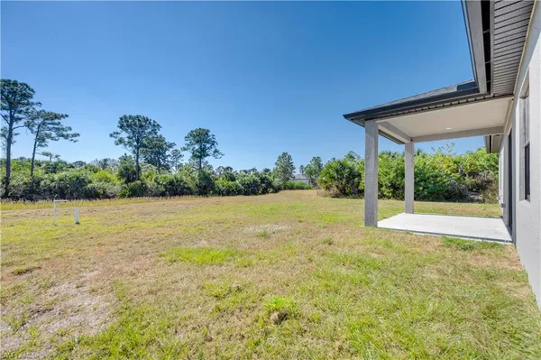 a view of a backyard of a house