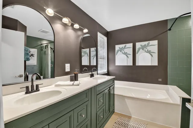 a front view of a house with a yard and patio