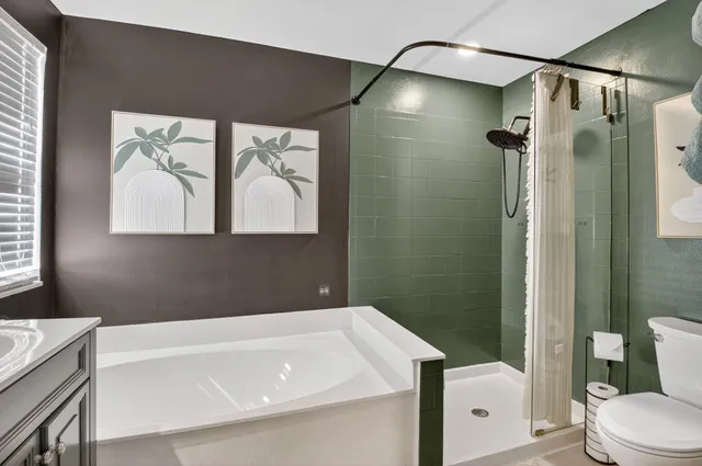 a view of a golf course with a lake