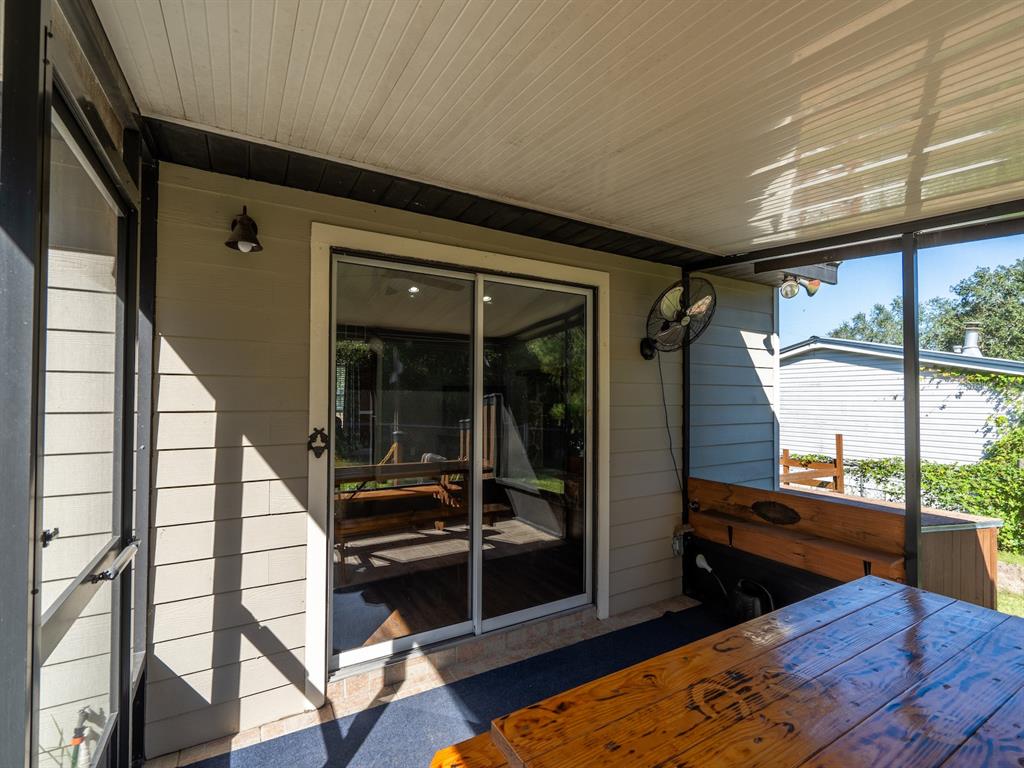 13425 Maple Drive Fort McCoy, FL 32134 - Photo 21 of 41 a view of living room with furniture and window