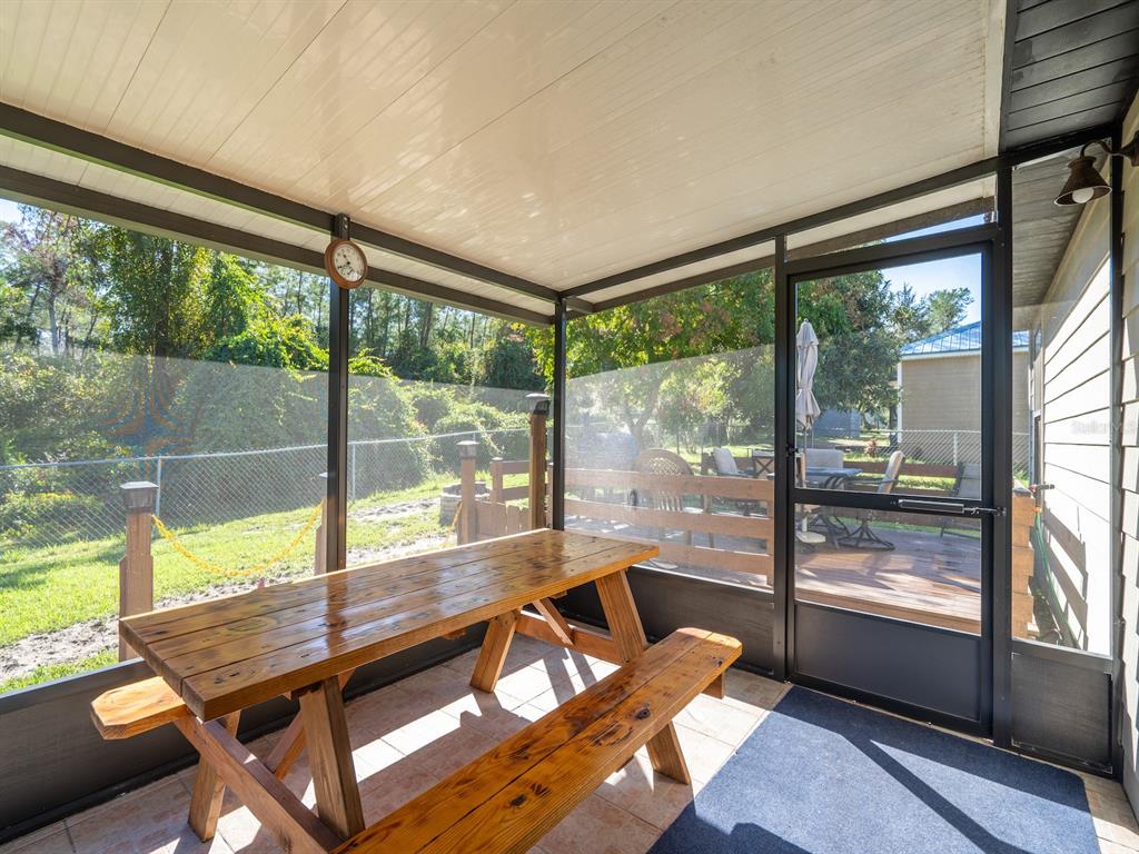 13425 Maple Drive Fort McCoy, FL 32134 - Photo 22 of 41 a view of a room with a large window