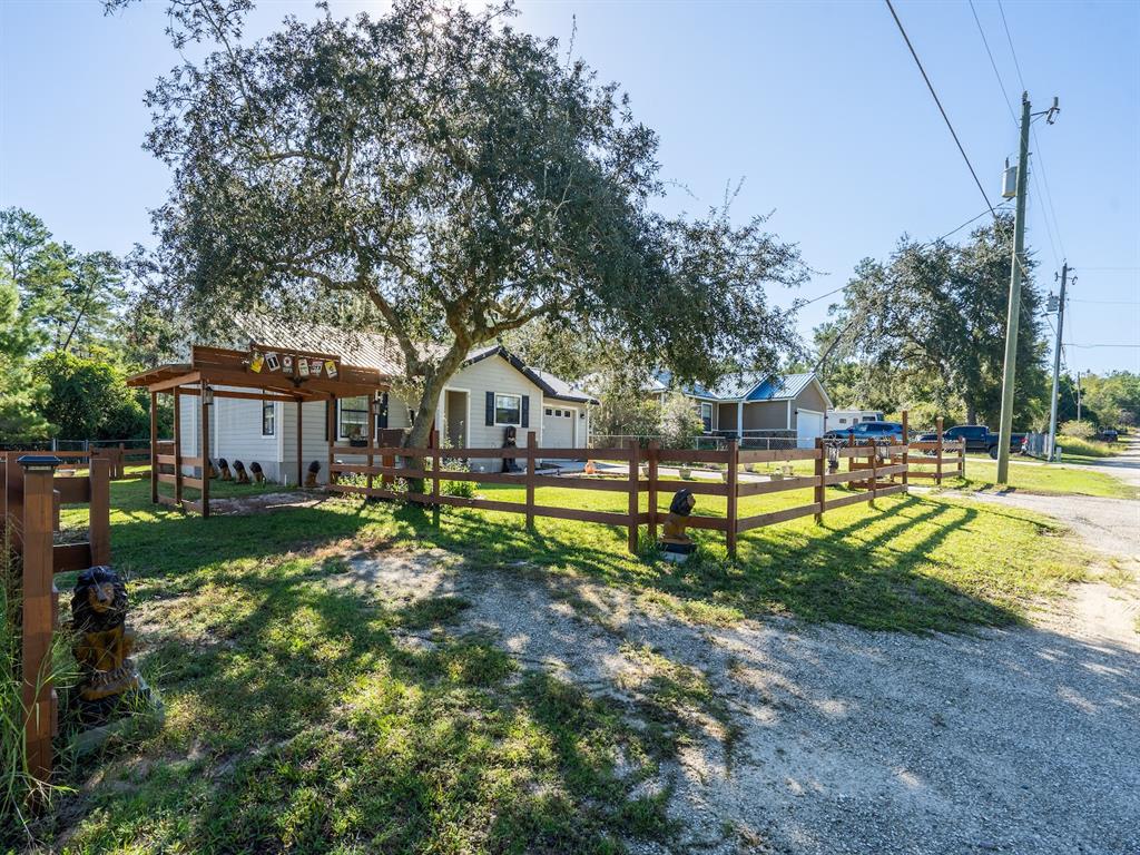 13425 Maple Drive Fort McCoy, FL 32134 - Photo 3 of 41 a view of house with outdoor space and swimming pool