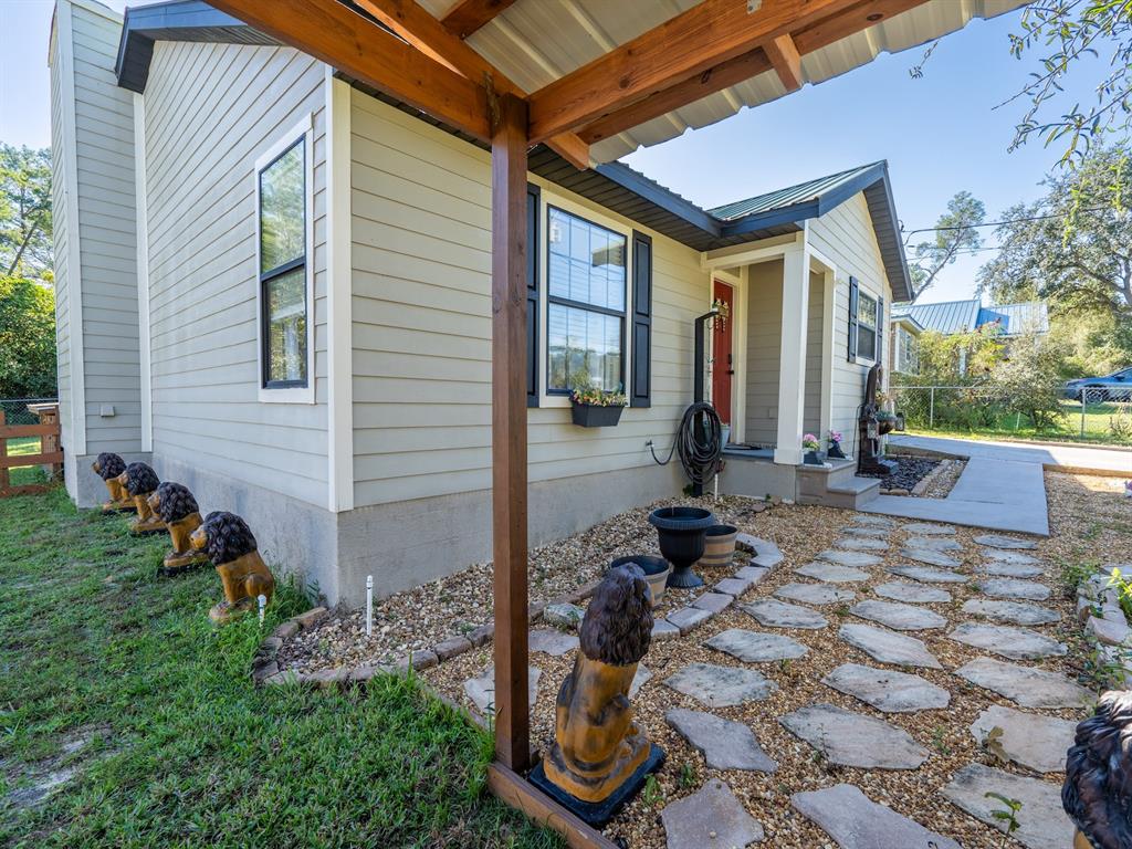 13425 Maple Drive Fort McCoy, FL 32134 - Photo 33 of 41 a front view of a house with garden