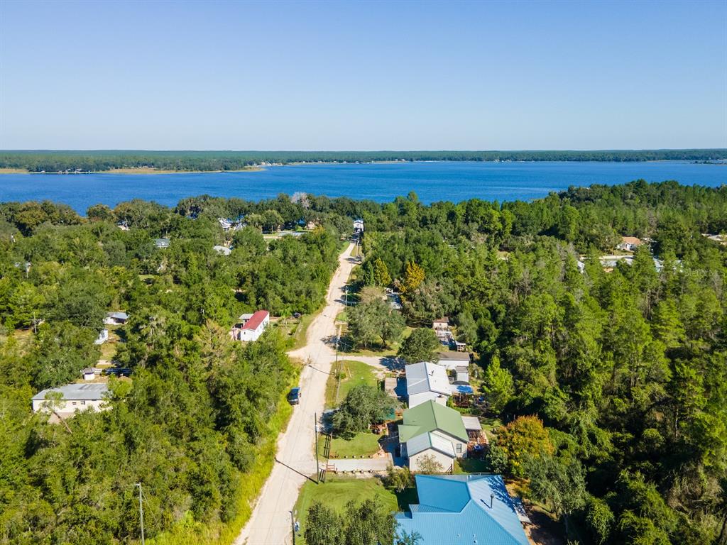 13425 Maple Drive Fort McCoy, FL 32134 - Photo 39 of 41 an aerial view of a house with a yard