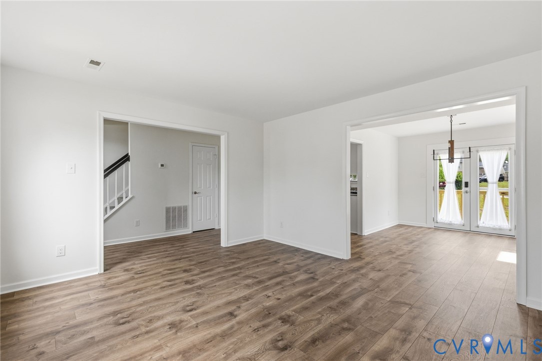 3230 Ransom Hills Road North Chesterfield, VA 23237 - Photo 11 of 27 Living room with new flooring. The living room ope