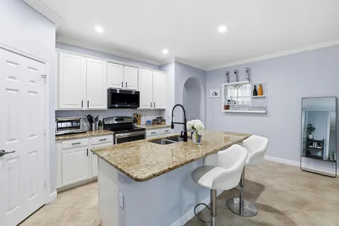 $500,000 | 10457 Wellington Parc Drive, Wellington, FL 33449