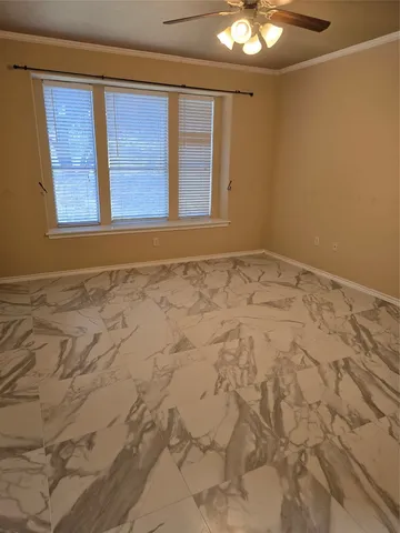 a view of an empty room and window