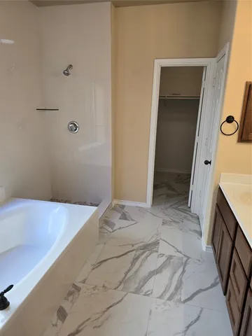 a bathroom with a sink and a tub