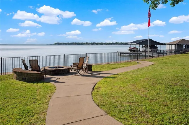 a view of a swimming pool with lounge chairs