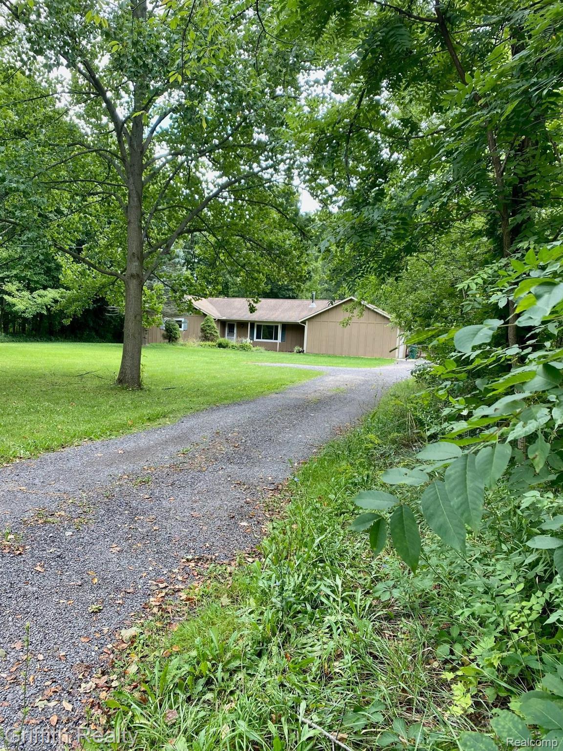 5761 Warner Road Fowlerville, MI 48836 - Photo 2 of 63 Set back off road, 3/4 from paved Grand Rv.