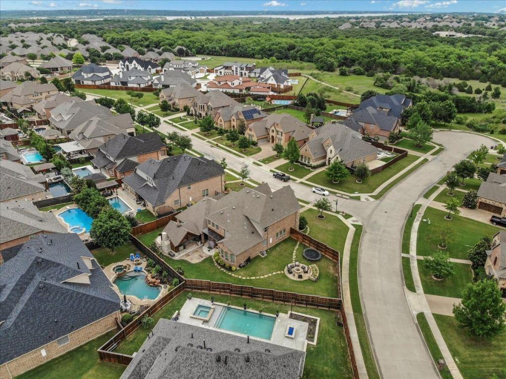 2832 Mona Vale Road Trophy Club, TX 76262 - Photo 34 of 37 an aerial view of a swimming pool yard and mountain view in back