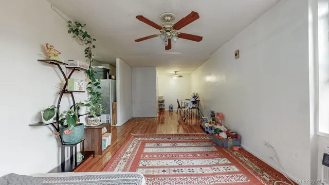 a view of a hallway with a potted plant