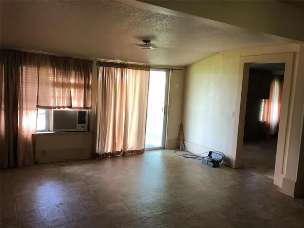 a view of a livingroom with a fireplace