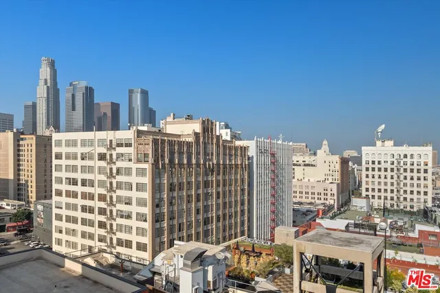 a view of city with tall buildings