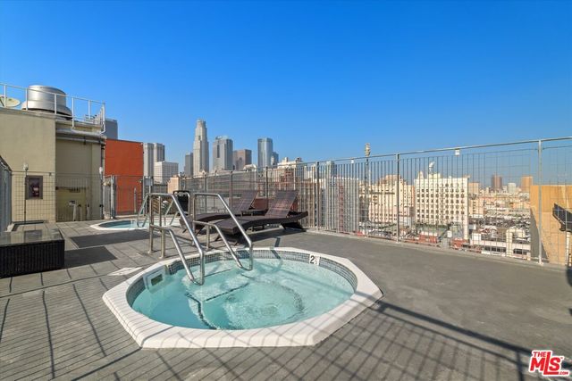 a patio with a table and chairs