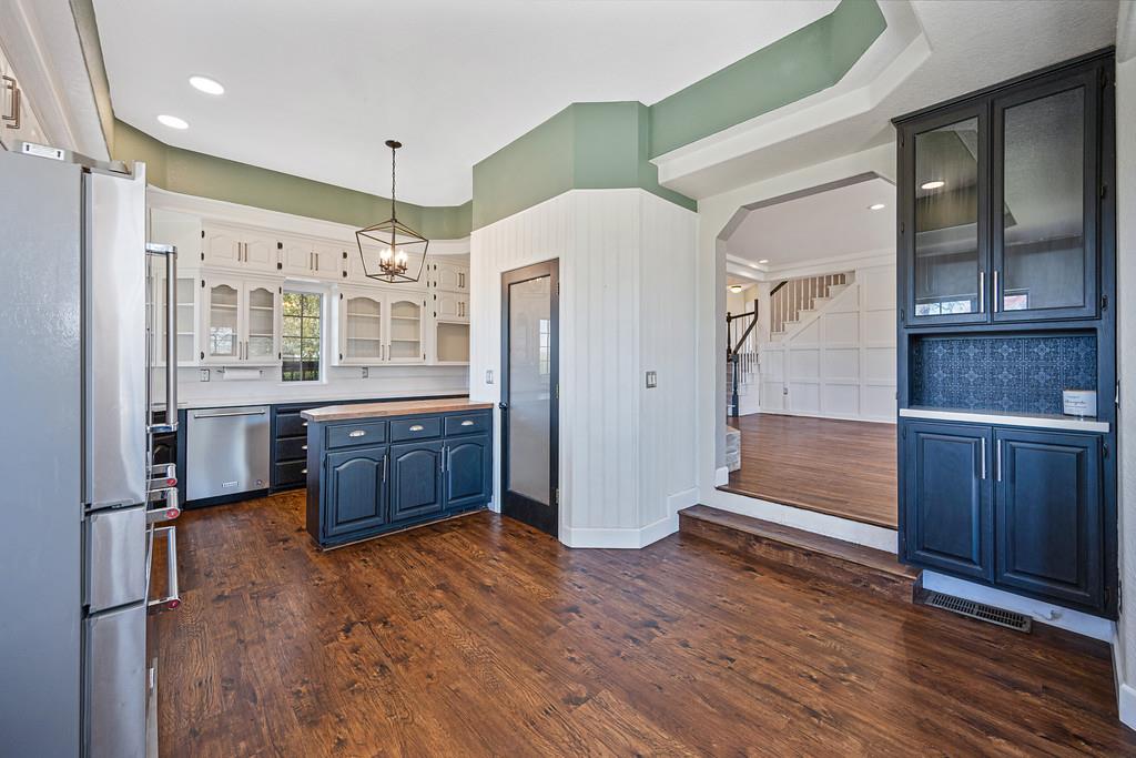 3154 Twin K Road Pilot Hill, CA 95664 - Photo 37 of 89 a kitchen with stainless steel appliances a refrigerator and a wooden floors