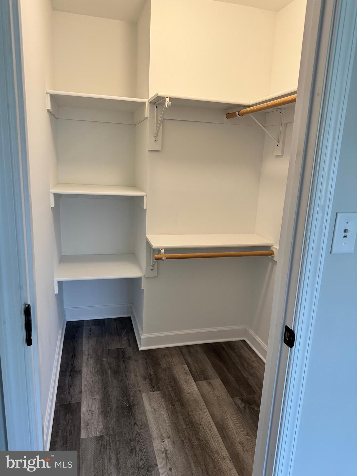7052 Winchester Avenue Inwood, WV 25428 - Photo 10 of 17 a view of walk in closet with empty racks