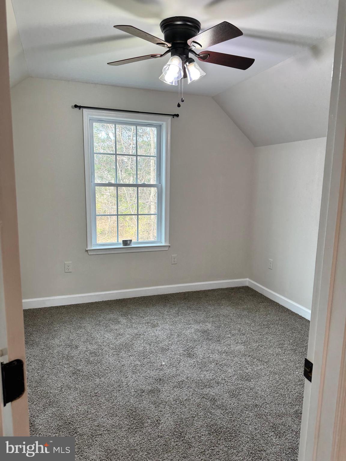 7052 Winchester Avenue Inwood, WV 25428 - Photo 13 of 17 a view of an empty room with a window