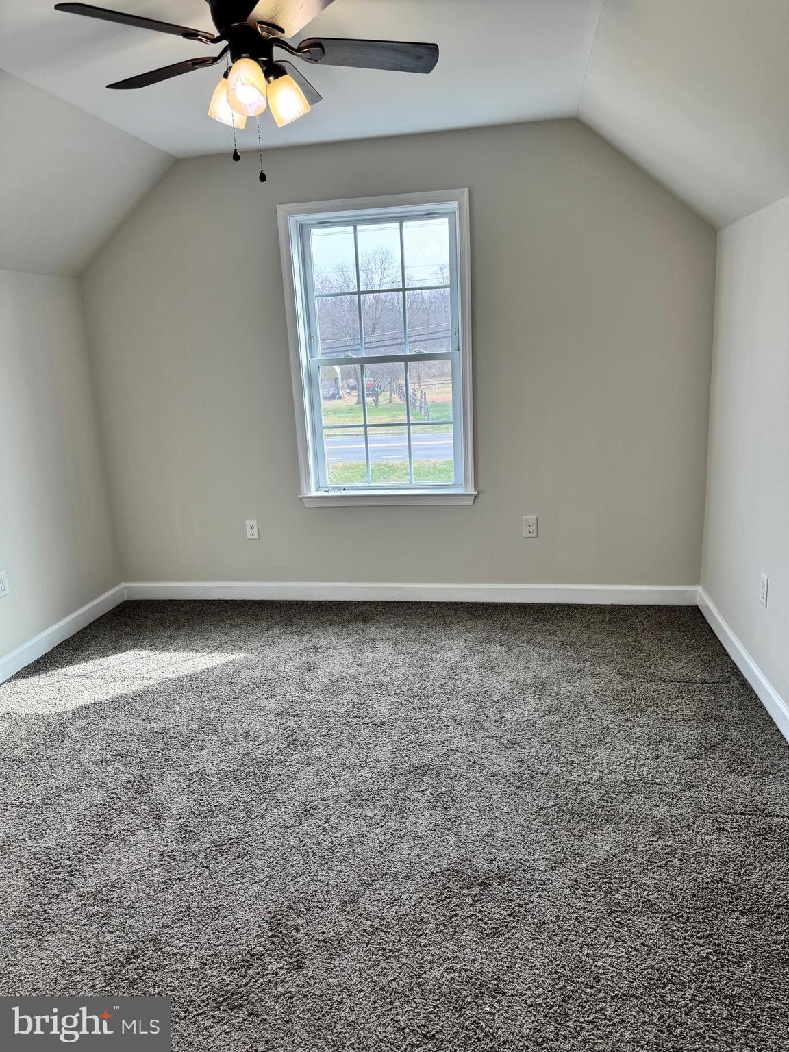 7052 Winchester Avenue Inwood, WV 25428 - Photo 15 of 17 an empty room with a window