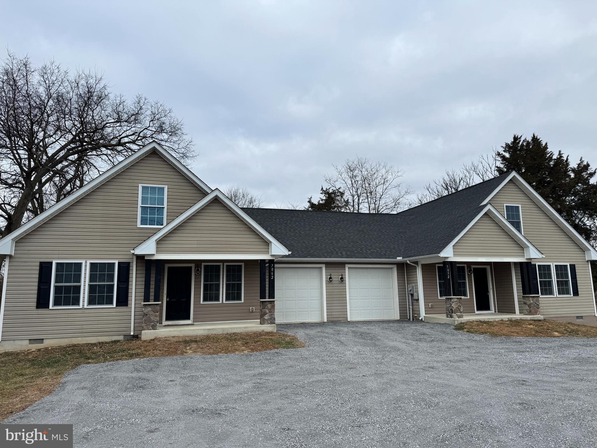 7052 Winchester Avenue Inwood, WV 25428 - Photo 2 of 17 front view of a house with a yard