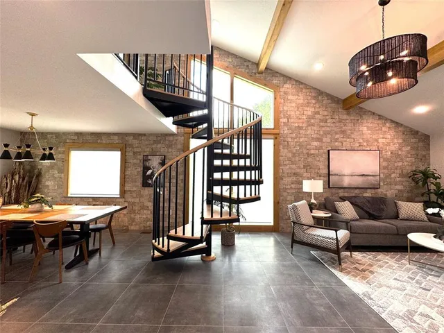 a spacious bathroom with a bathtub sink and mirror