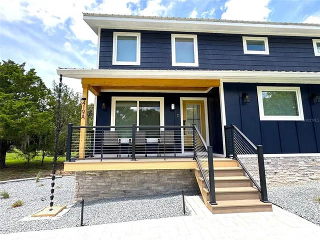 a kitchen with stainless steel appliances granite countertop a stove and a sink