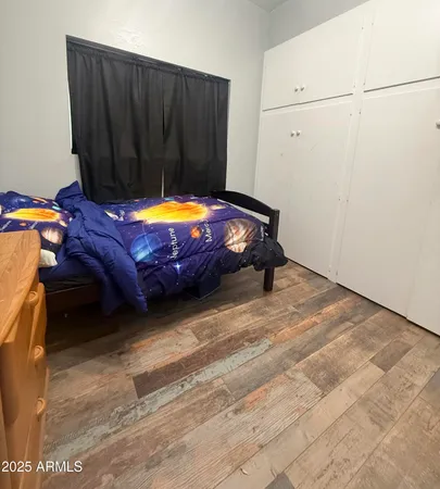 a room with a bed and a table