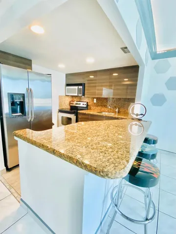 a bathroom with a toilet a sink and a mirror