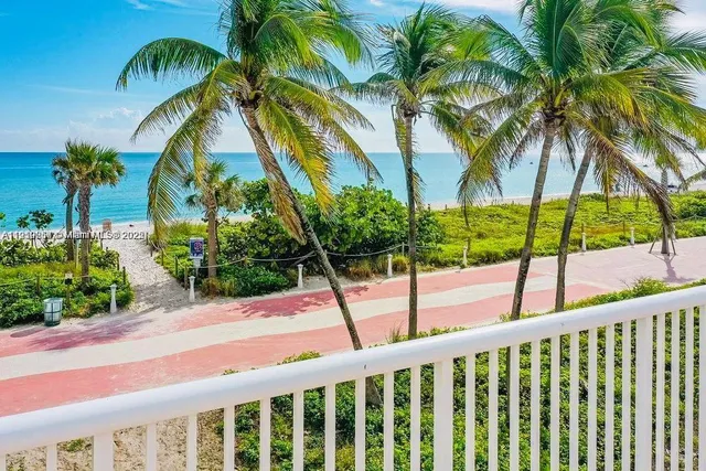 a view of balcony with a palm tree