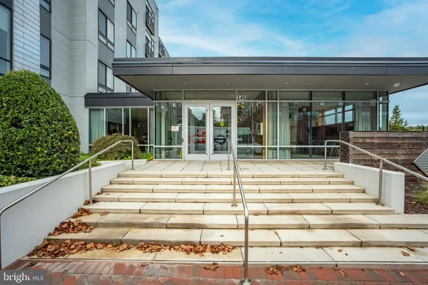 a front view of a building with street view