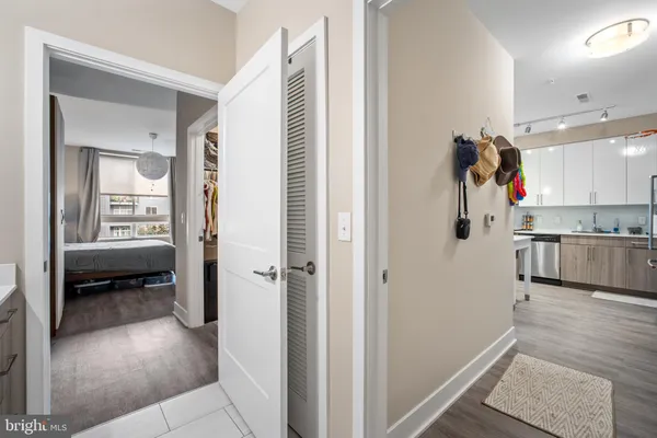 a view of kitchen with cabinets and wooden floor