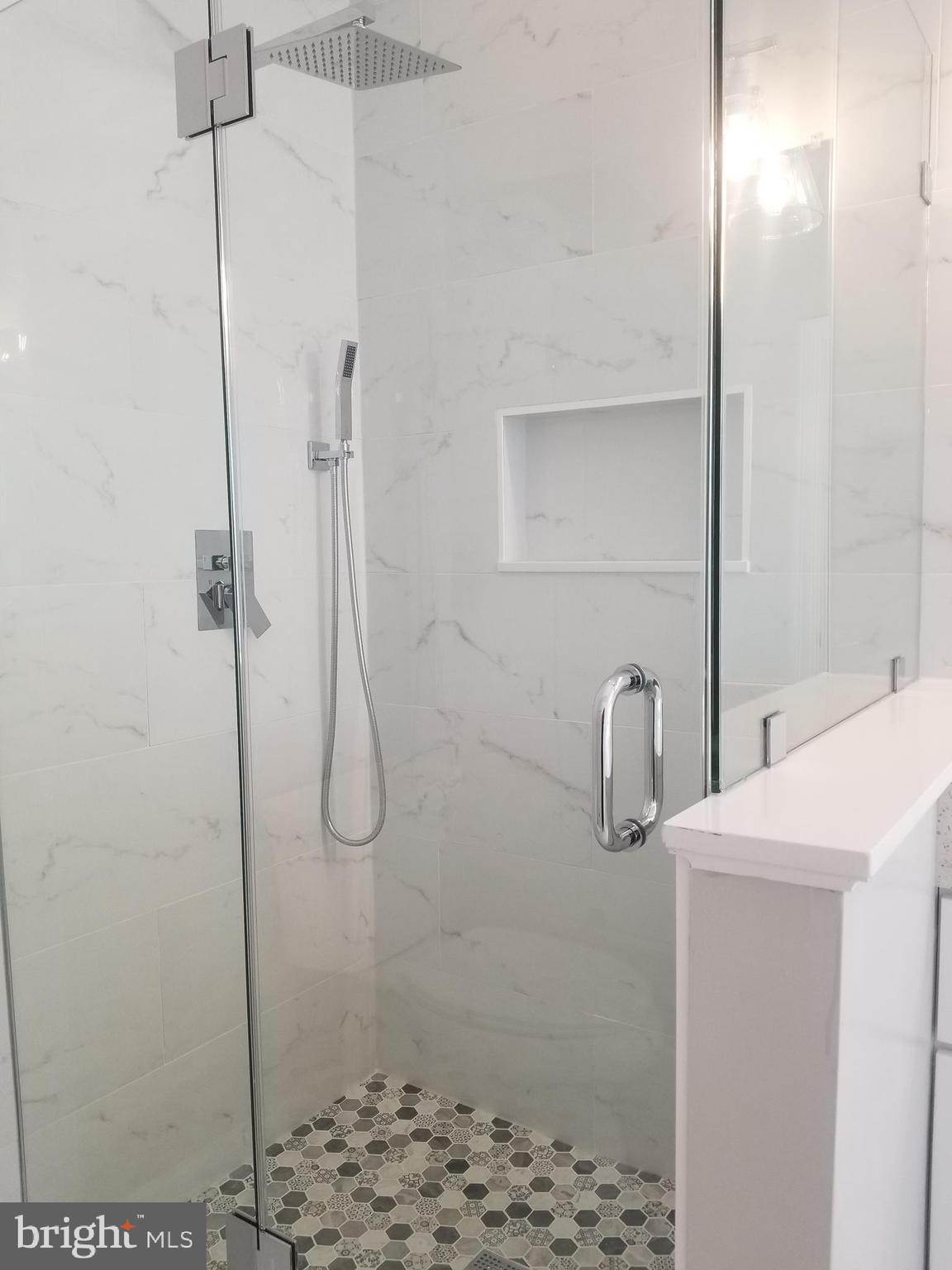141 Roland Court Southwest Vienna, VA 22180 - Photo 9 of 32 New shower stall in Master bath w/ frameless glass