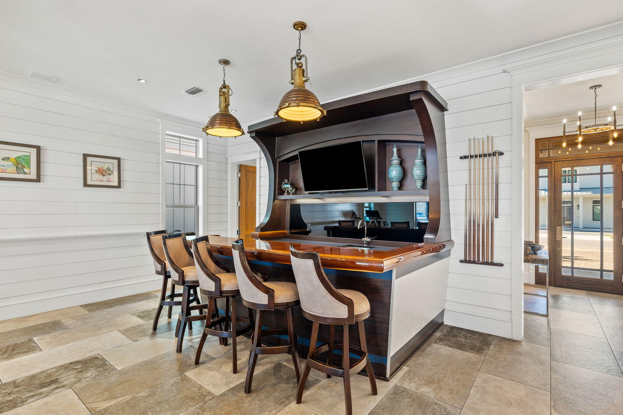 89 Shirah Street Destin, FL 32541 - Photo 12 of 69 a dining hall with stainless steel appliances granite countertop a stove a oven a dining table and chairs with wooden floor
