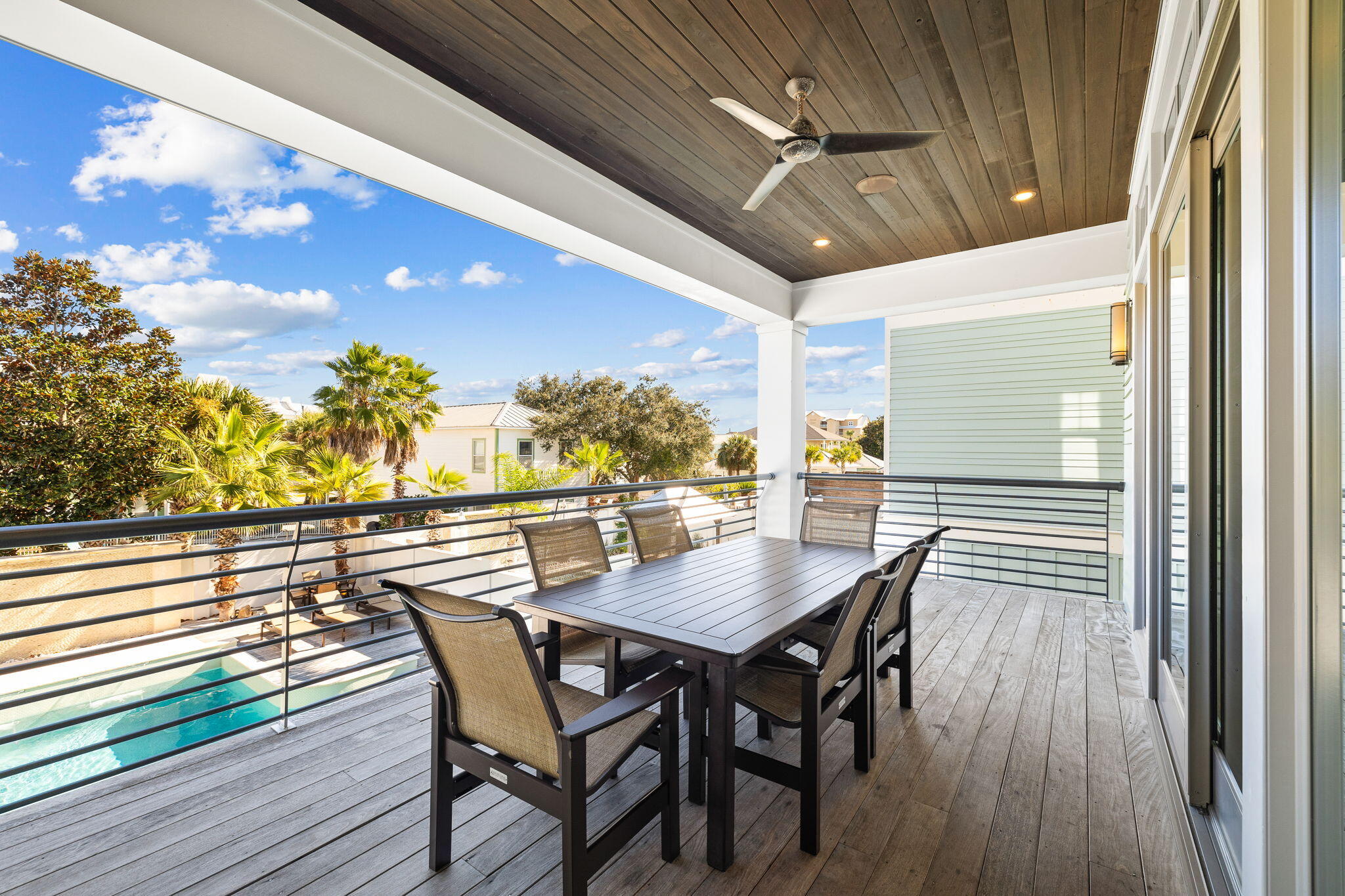 89 Shirah Street Destin, FL 32541 - Photo 24 of 69 a dining room with furniture and wooden floor
