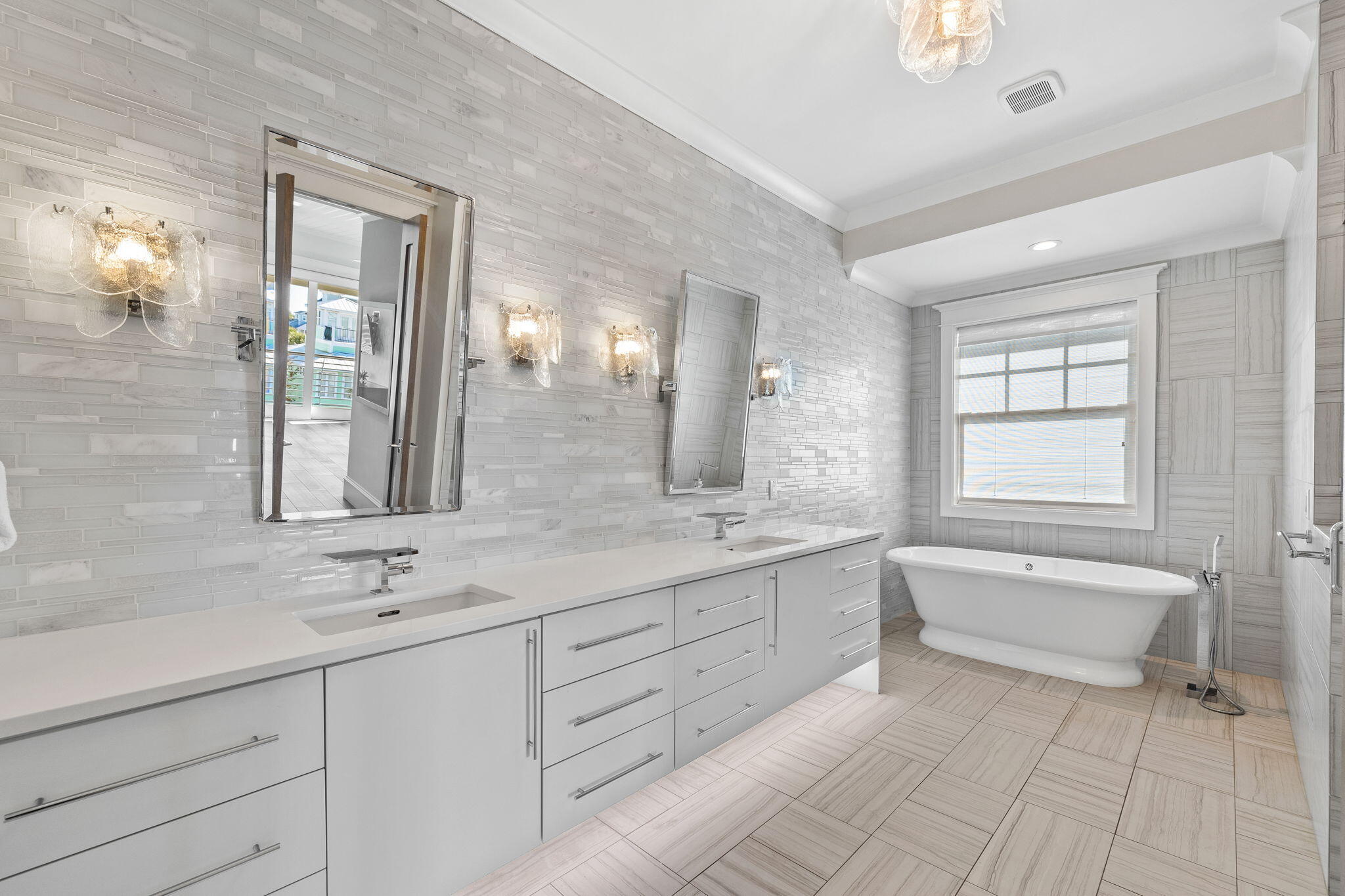 89 Shirah Street Destin, FL 32541 - Photo 50 of 69 a bathroom with a granite countertop sink mirror and bathtub