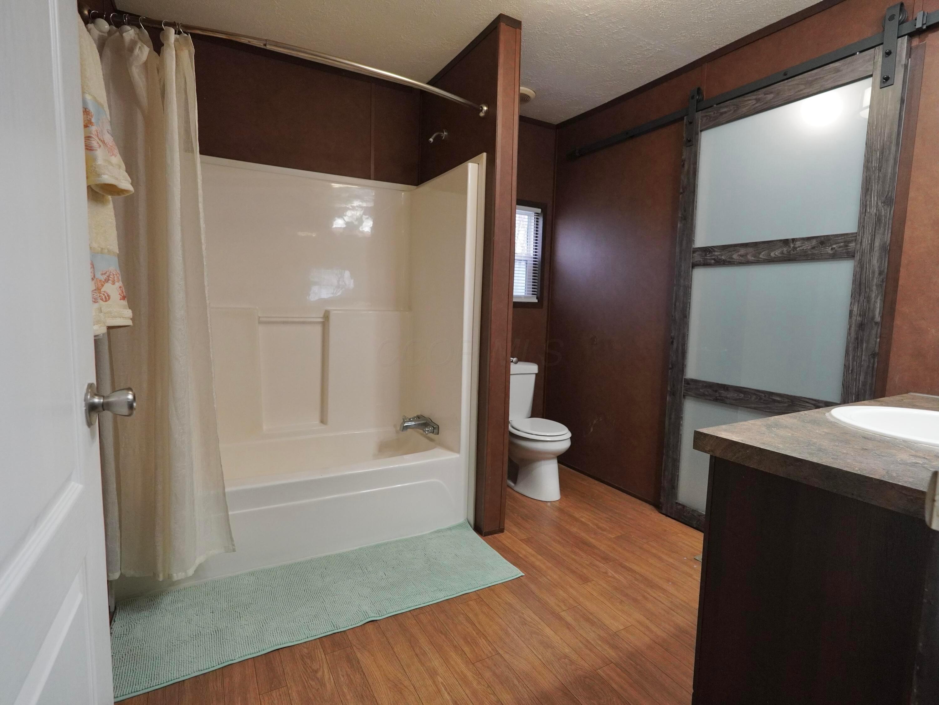 8565 Smith-Calhoun Road, Unit 128 Plain City, OH 43064 - Photo 13 of 22 Primary Bath