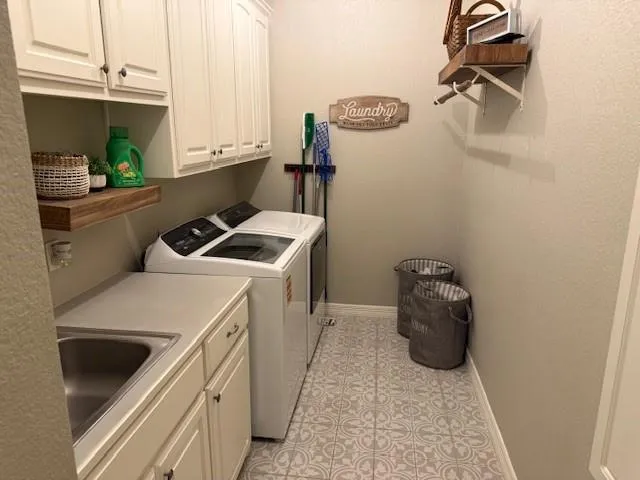 a view of a table and chairs under an umbrella