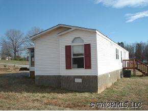 601 Parris Road Rutherfordton, NC 28139 - Photo 2 of 12 a view of a house with a yard