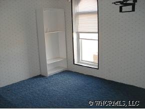601 Parris Road Rutherfordton, NC 28139 - Photo 11 of 12 a view of an empty room and a window